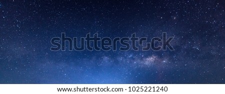 Panorama blue night sky milky way and star on dark background.with noise and  grain.Photo by long exposure and select white balance. Royalty-Free Stock Photo #1025221240
