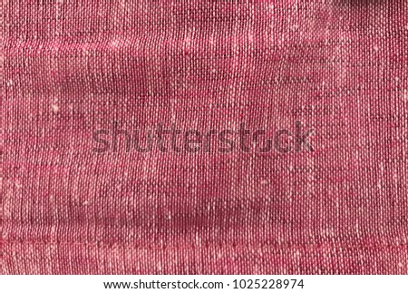 red coloured cloth material or Fabric