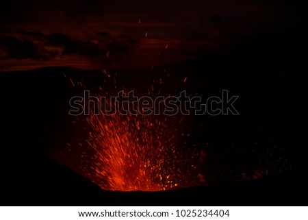 Eruption Yasur vulcano and sunset on the crater edge, Tanna, Vanuatu