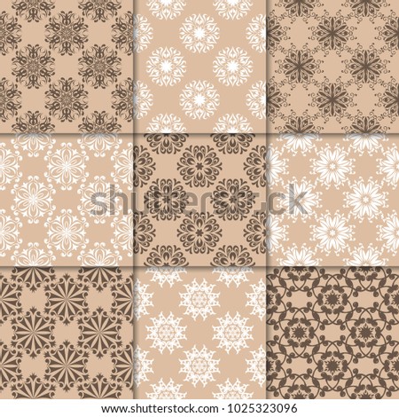 Brown beige floral ornaments. Collection of seamless patterns for paper, textile