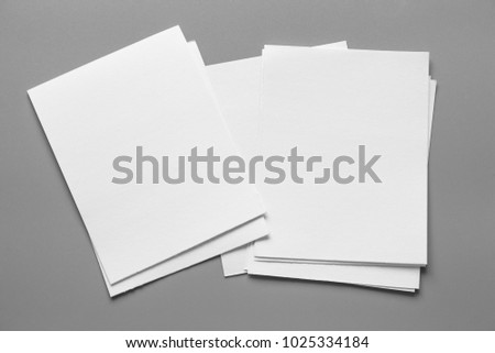 Mock up white paper on gray background.