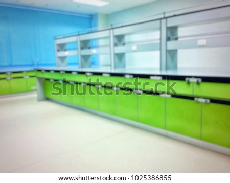 Green bench lab in chemistry laboratory room. Environmental health laboratory. Blur image Use for science background.
