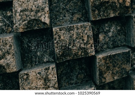 
Squares cut from stones. Background, texture