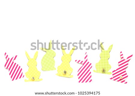 Easter bunny (Easter rabbit) craft of paper, isolated on white background. Festive decor of handmade.