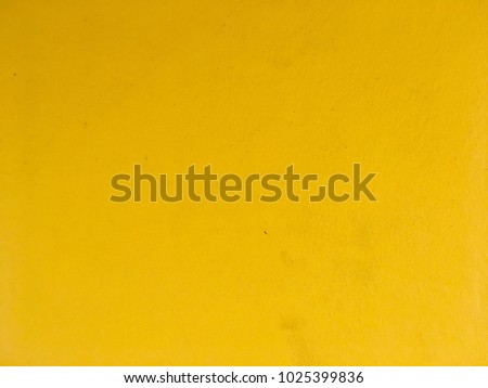 Yellow concrete wall background for backdrop
