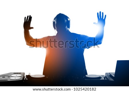 DJ silhouette. Silhouette of DJ gesturing and spinning on turntable