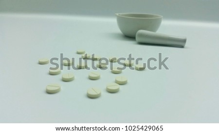 Tablets and mortar in the pharmacy laboratory