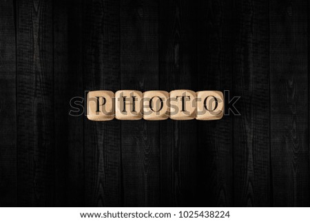 Photo word on wooden cubes. Photo concept