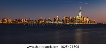 Long exposure of New York City at sunset.