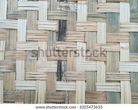 Textured and patterned walls of bamboo.