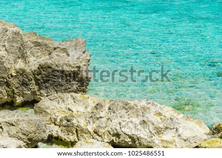 Stones in the sea on the Lefkada island, near a wild beach ,Greece