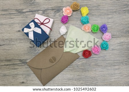 Rose flowers Out Of A Forgive Me Letter. Flat lay image.