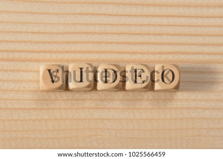 Video word on wooden cubes. Video concept