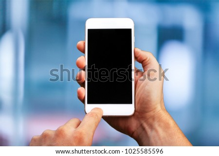 Hand using phone mobile