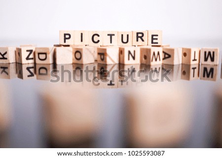 Picture word cube on reflection