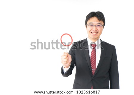 Businessman giving ok sign