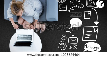 Woman on her laptop against black background