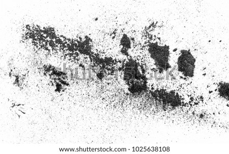 black dust powder on white background