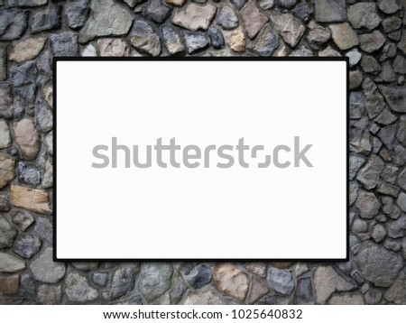 Blank Canvas on a Stone Wall