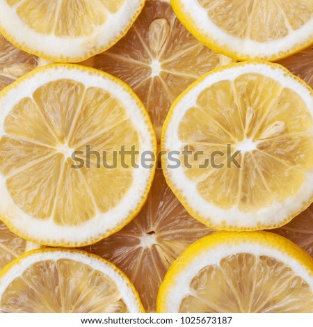 Fresh sliced lemon on a wooden board