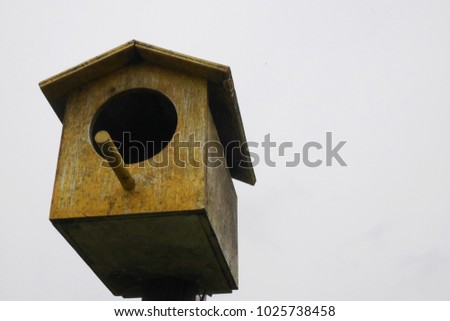 wooden birdhouse isolated on white background
