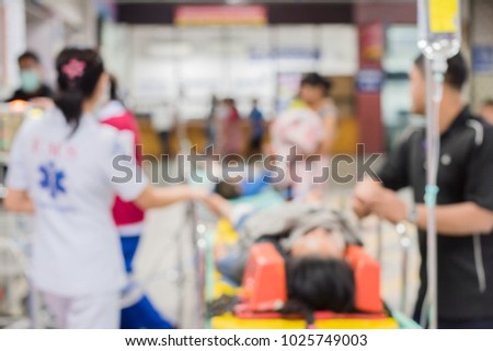Blurred image of patients with treatment in the hospital.