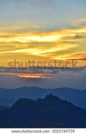 Sunset  in the mountains landscape, A beautiful viewpoint of Doi pha tung , chiang rai , Thailand.
