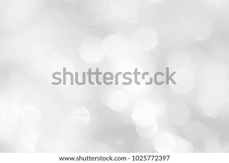 A brilliant blurry background of white and gray. Template for a holiday greeting card and labels with a pattern of circles with glitter.