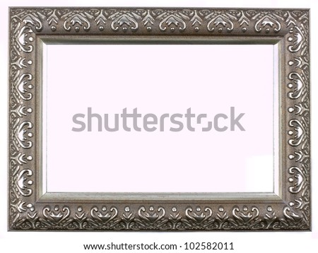 Antique silver picture frame with a decorative pattern on white background.