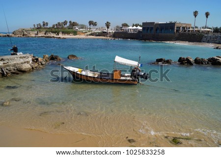 Fishing boat in the Mediterranean Sea near the coast of Caesarea (Israel)