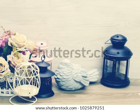 vintage candle light home decoration on wooden space background