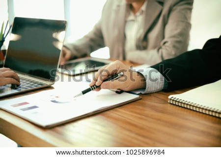 business people meeting brainstorming and discussing project together in office, teamwork concept Royalty-Free Stock Photo #1025896984