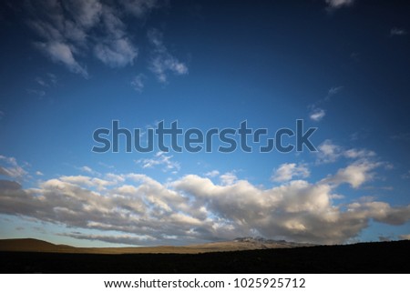 Clouds with blue sky at sunset while hiking up mount Kilimanjaro, Africa