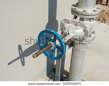 Water Valves,  Pipe support for water tank.
