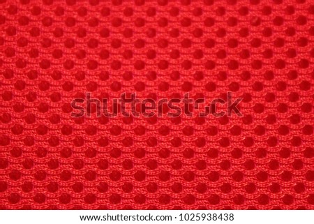 red textured background with squares