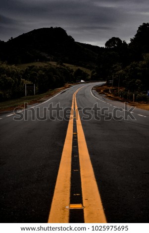 Road with mountains in the background