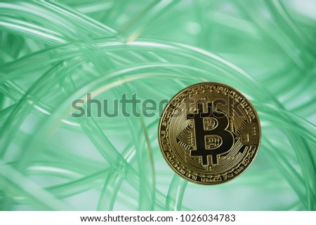 green color cable on white background. abstract. bitcoin.