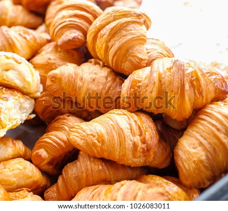 Lots of croissants on the  salver Royalty-Free Stock Photo #1026083011