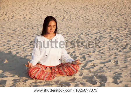 beautiful young woman doing yoga