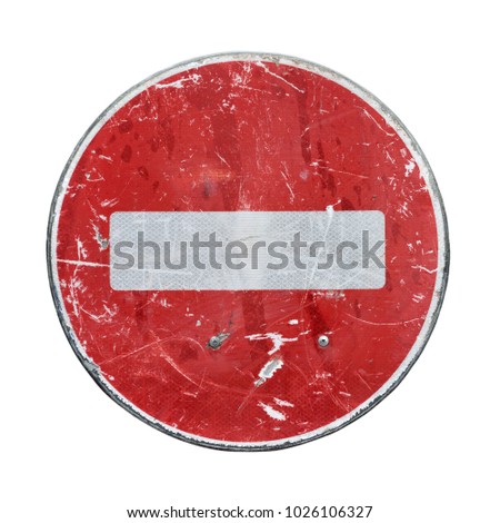 Old red stop road sign isolated on white background.