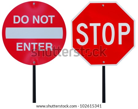 two red road signs on driving