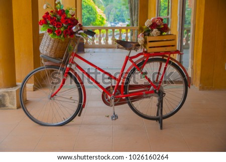 Old bicycle with flower,  Old bicycle in Thailand