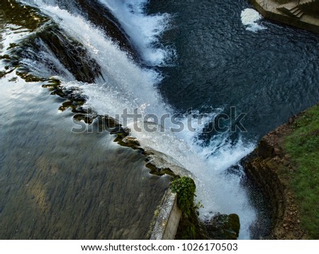 Beautiful enormous Jajce waterfall on the river Pliva.
