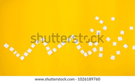 graph paper cut yellow background