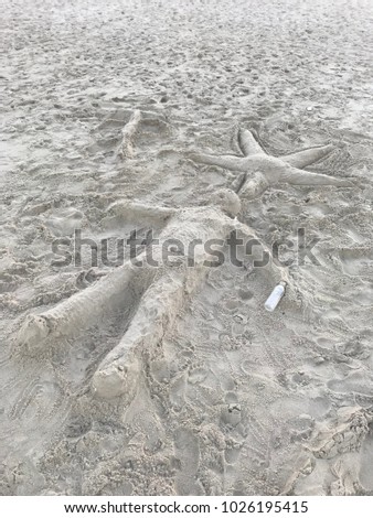 Image on sand.  Summer concept of rest.