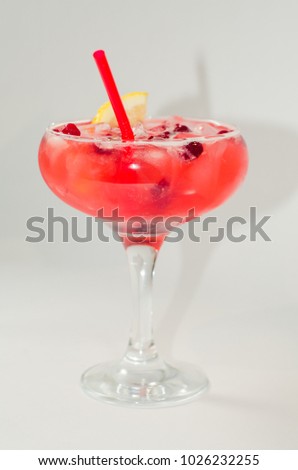 red alcohol cocktail with ice
