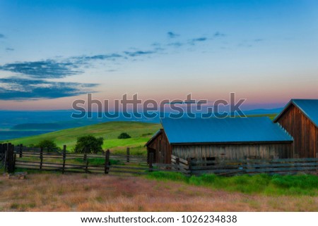 Dawn's Light view of out buildings and vast landscape of The Dallas Mountain Ranch, a popular hiking and picture taking place that is part of the Columbia Hills Natural Preserve and State park
