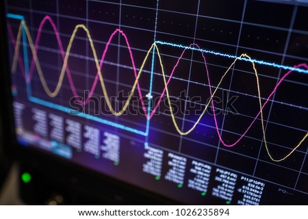 Digital oscilloscope is used by an experienced electronic engineer in the laboratory Royalty-Free Stock Photo #1026235894