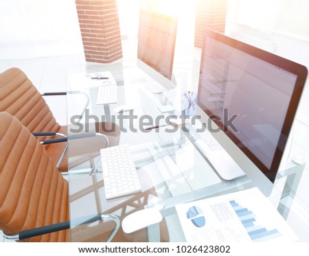 stylish workplace with computer in modern office