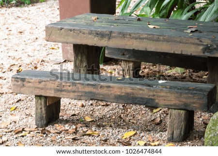Wooden bench or chair isolated in park in Singapore during day